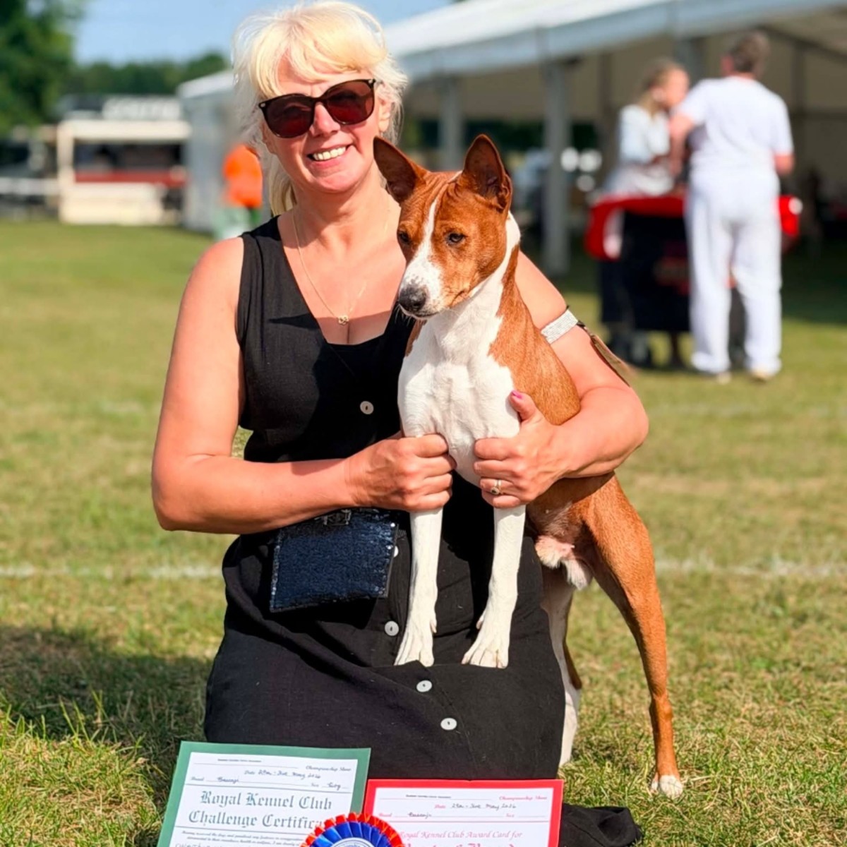 Archer and handler posing with Best of Breed awards at Southern Counties
